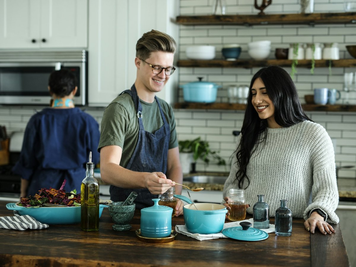 Mamadou and Gaby cooking together — where Lucky Mama's began